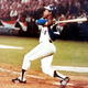 Hank Aaron hits one of the 12 home runs he tallied during the 1973-1/2 season.